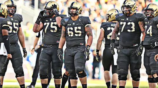 The Army West Point football offensive waits for QB Kelvin Hopkins during hearing the play call during the 2018 Lockheed Martin Armed Forces Bowl.