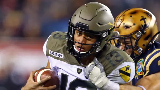 Dec 14, 2019; Philadelphia, PA, USA; Army Black Knights quarterback Christian Anderson (13) is tackled by Navy Midshipmen safety Evan Fochtman (11) during the second half at Lincoln Financial Field. Mandatory Credit: Danny Wild-USA TODAY Sports