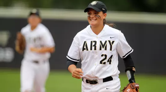 Grace Mattimore jogging off the field with a smile