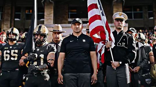 Head football coach Jeff Monken waits with his team outside the tunnel before the 2018 Lockheed Martin Armed Forces Bowl