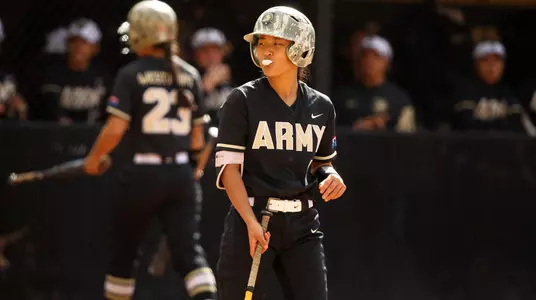 Ashley Yoo walking up to the batters box