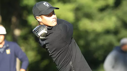 Justin Williamson tees off during the Army-Navy golf match in the fall of 2018.