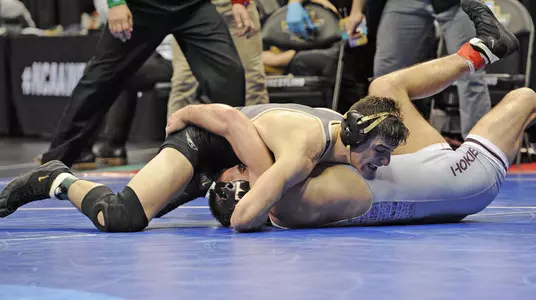 Ben Harvey advanced to the 174-pound Quarterfinals with an upset victory over 6-seed David McFadden of Virginia Tech on Thursday