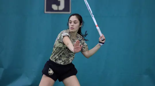 Paola Bou playing tennis