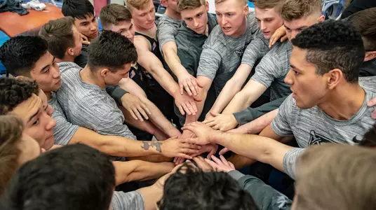 Gymnastics team huddle 2019