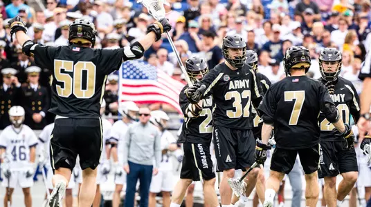 Miles Silva of the Army Black Knights, Sean O'Brien of the Army Black Knights, Nate Jones of the Army Black Knights, and Brendan Nichtern of the Army Black Knights during an NCAA Division I men's lacrosse game between the Army Black Knights and Navy Midshipmen at Navy Marine Corps Memorial Stadium on April 13, 2019 in Annapolis, MD.