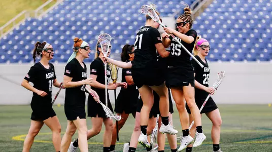 The Black Knights celebrate after scoring a goal