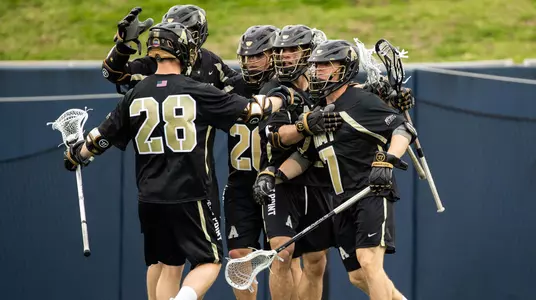 Connor Dewitt of the Army Black Knights, Nate Jones of the Army Black Knights, Nicholas Garofano of the Army Black Knights during an NCAA Division I men's lacrosse game between the Army Black Knights and Navy Midshipmen at Navy Marine Corps Memorial Stadium on April 13, 2019 in Annapolis, MD.