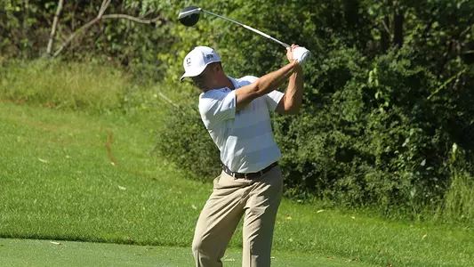 Nick Turner drives off the tee against Navy in the fall of 2018.