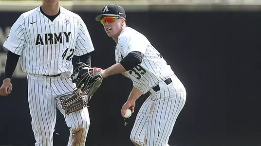 Jacob Hurtubise picks up a loose ball in center field in a contest with Patriot League foe Lehigh.