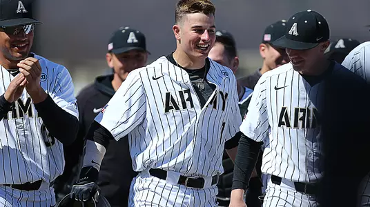 Army celebrates after Anthony Giachin hits a home run