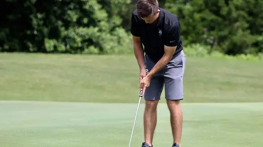 Nick Turner sinks a putt for birdie at the NCAA Regionals at UT Golf Club in Austin, Texas.