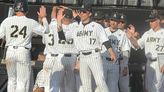 Army celebrates after putting up 23 runs against Villanova.