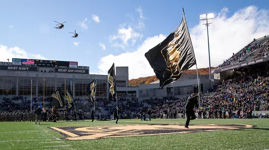 WEST POINT, NY - NOVEMBER 03: The Army Black Knights run onto the field as helicopters fly over before the start of a game between the Army Black Knights and the Air Force Falcons at Michie Stadium on November 3, 2018 in West Point, New York. (Photo by Dustin Satloff/Getty Images)