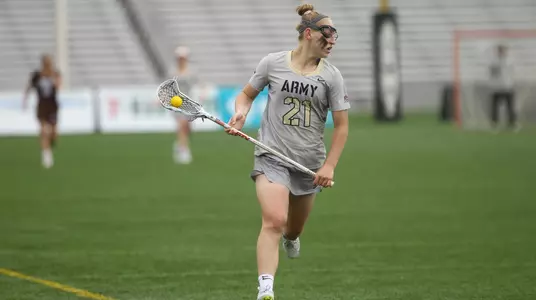 Caroline Raymond brings the ball down the field