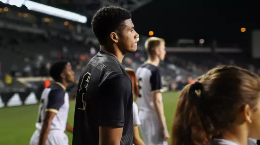 Zac McGraw walks onto the field for introductions
