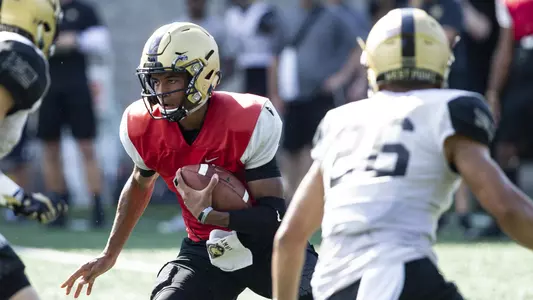 Christian Anderson runs up a hole during fall preseason camp on Aug. 12 at West Point.