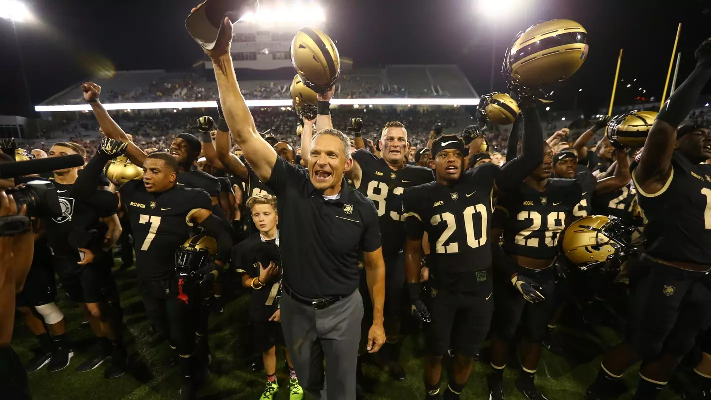 Football celebrates after home win over Rice