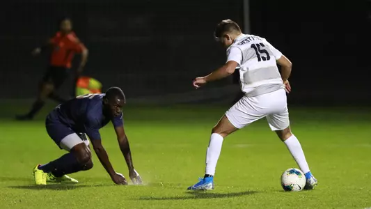 Alex Grave de Peralta crosses up a defender