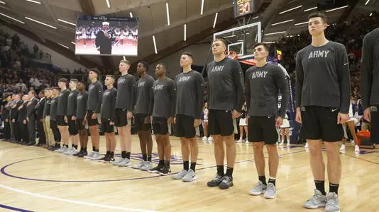 Army men's basketball lines up for the anthem prior to its season opener at Villanova
