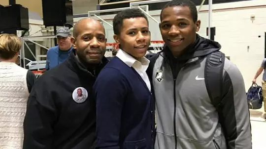 CJ Morgan with family after a wrestling match in Christl Arena