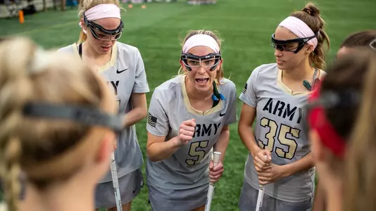 Ryan Murphy of the Army Black Knights and Taylor Korpela of the Army Black Knights during an NCAA Division I women's lacrosse game between the Army Black Knights and Bucknell Bison at Michie Stadium on April 25, 2019 in West Point, NY.