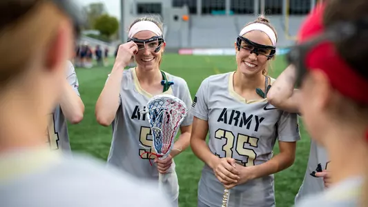 Ryan Murphy of the Army Black Knights and Taylor Korpela of the Army Black Knights during an NCAA Division I women's lacrosse game between the Army Black Knights and Bucknell Bison at Michie Stadium on April 25, 2019 in West Point, NY.