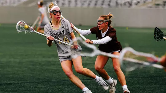 Rilee Scott battles through traffic and looks to pass