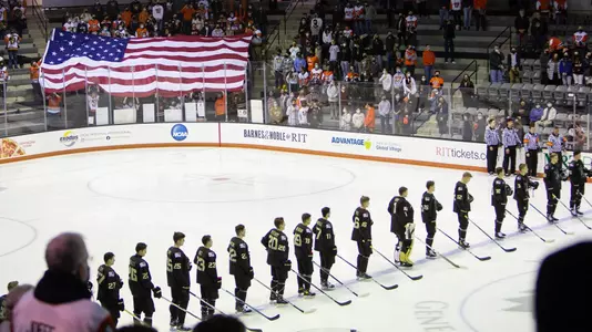 Army lines up for the national anthem