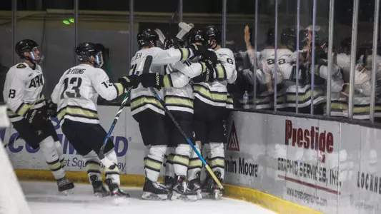 Army celebrates after a 2-1 overtime victory against Sacred Heart on Feb. 9.