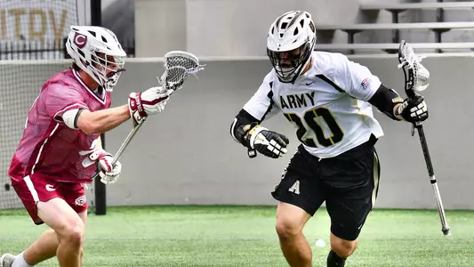 Brendan Nichtern attacks the net against Colgate in a 13-11 win on April 30, 2021