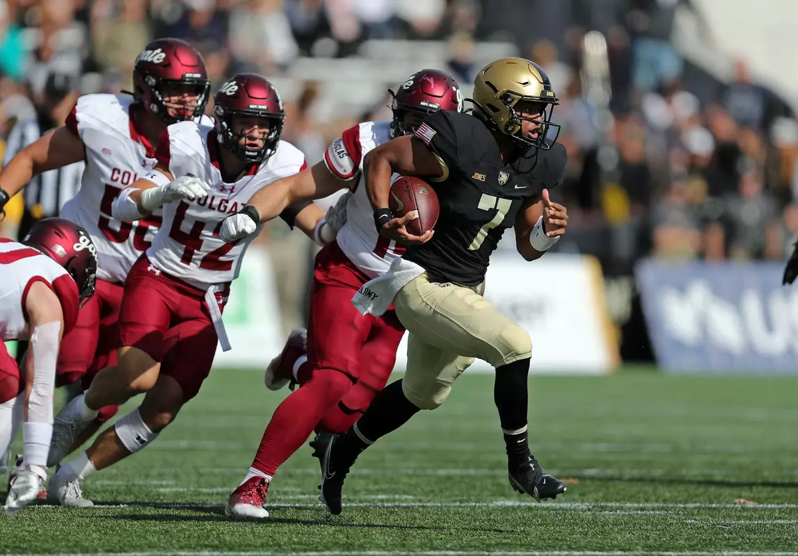 Oct 15, 2022; West Point, New York, USA; Army Black Knights quarterback Jemel Jones (7) runs for a touchdown against the Colgate Raiders during the first half at Michie Stadium. Mandatory Credit: Danny Wild-USA TODAY Sports