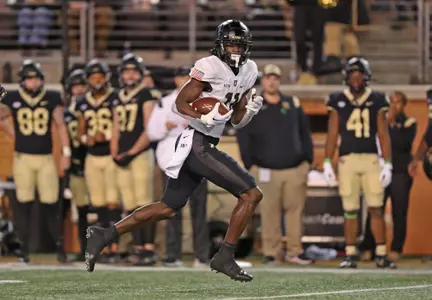 Oct 8, 2022; Winston-Salem, North Carolina, USA; Army Black Knights wide receiver Isaiah Alston (11) runs after making a catch against the Wake Forest Demon Deacons during the second half at Truist Field. Mandatory Credit: Danny Wild-USA TODAY Sports