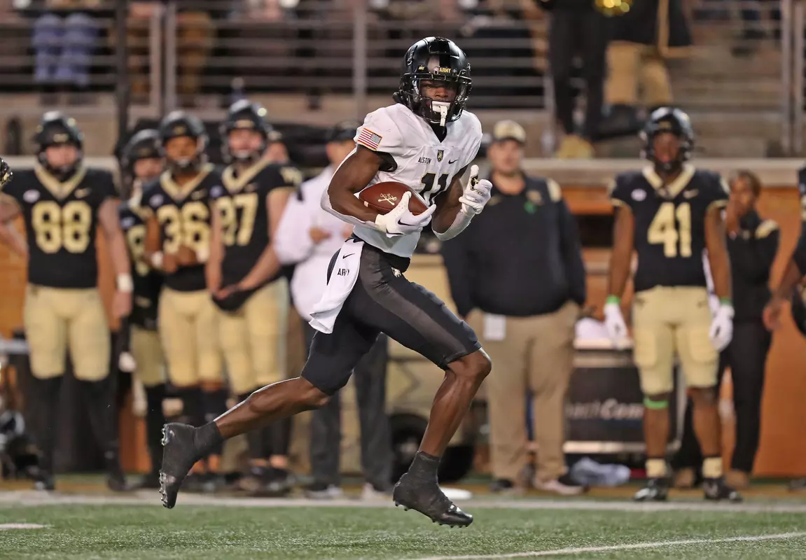 Oct 8, 2022; Winston-Salem, North Carolina, USA; Army Black Knights wide receiver Isaiah Alston (11) runs after making a catch against the Wake Forest Demon Deacons during the second half at Truist Field. Mandatory Credit: Danny Wild-USA TODAY Sports