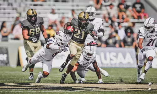 Sep 10, 2022; West Point, New York, USA; Army Black Knights running back Tyrell Robinson (21) carries the ball against the UTSA Roadrunners during the first half at Michie Stadium. Mandatory Credit: Danny Wild-USA TODAY Sports