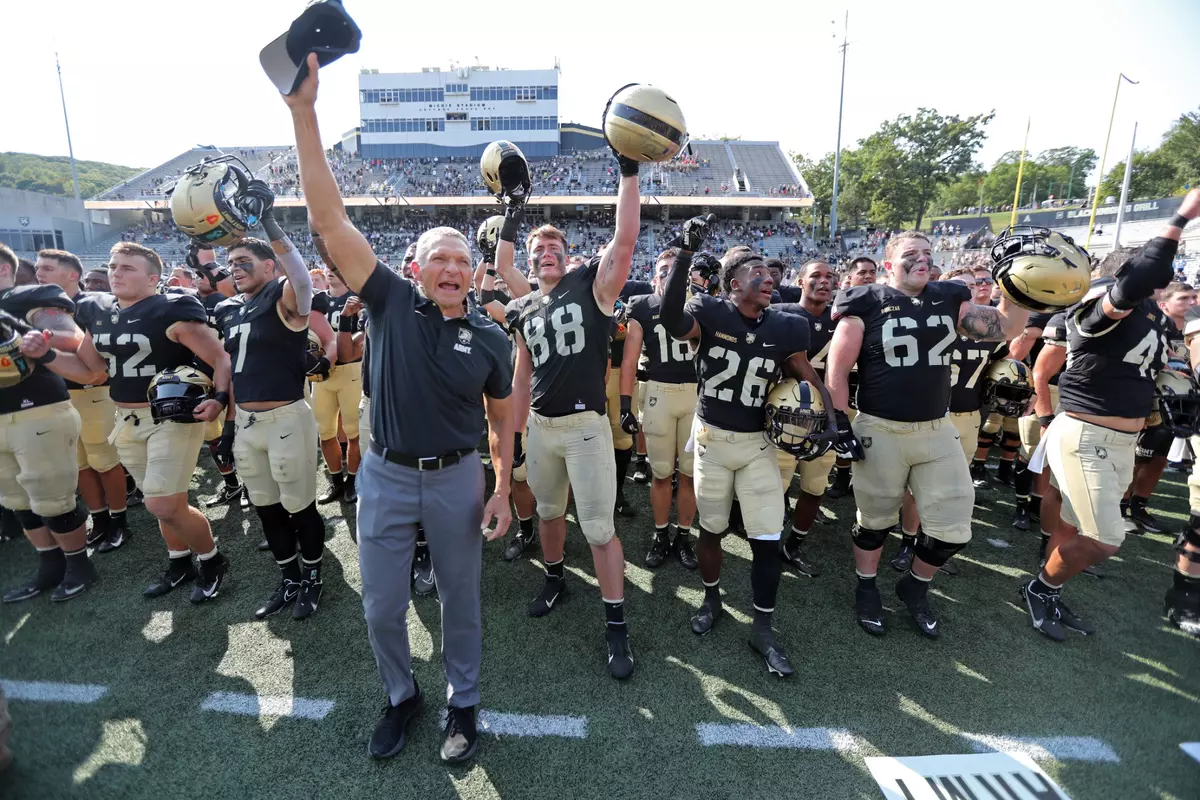 Sep 17, 2022; West Point, New York, USA; Army Black Knights head coach Jeff Monken celebrates with his player after a win against the Villanova Wildcats at Michie Stadium. Mandatory Credit: Danny Wild-USA TODAY Sports