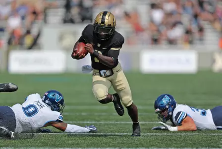 Sep 17, 2022; West Point, New York, USA; Army Black Knights quarterback Tyhier Tyler (2) runs for a touchdown against the Villanova Wildcats during the first half at Michie Stadium. Mandatory Credit: Danny Wild-USA TODAY Sports