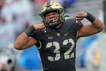 Oct 7, 2023; West Point, New York, USA; Army Black Knights running back Tyson Riley (32) reacts after a touchdown against the Boston College Eagles  during the second half at Michie Stadium. Mandatory Credit: Danny Wild-USA TODAY Sports