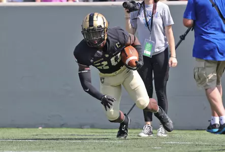 Sep 17, 2022; West Point, New York, USA; Army Black Knights defensive back Marquel Broughton (20) makes an interception against the Villanova Wildcats during the first half at Michie Stadium. Mandatory Credit: Danny Wild-USA TODAY Sports