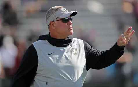 Oct 15, 2022; West Point, New York, USA; Army Black Knights defensive coordinator Nate Woody coaches his players before a game against the Colgate Raiders at Michie Stadium. Mandatory Credit: Danny Wild-USA TODAY Sports