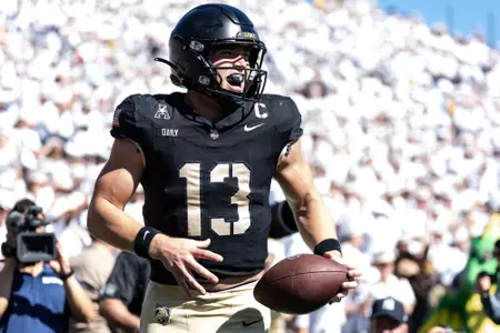 WEST POINT, NEW YORK - OCTOBER 12: Bryson Daily #13 of the Army Black Knights reacts after rushing for a touchdown during the first quarter of the game against the UAB Blazers at Michie Stadium on October 12, 2024 in West Point, New York. (Photo by Dustin Satloff/Getty Images)