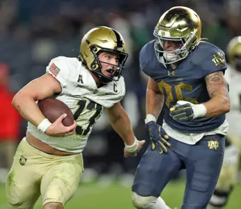 Nov 23, 2024; New York, New York, USA; Army Black Knights quarterback Bryson Daily (13) carries the ball against the Notre Dame Fighting Irish during the second half at Yankee Stadium. Mandatory Credit: Danny Wild-Imagn Images
