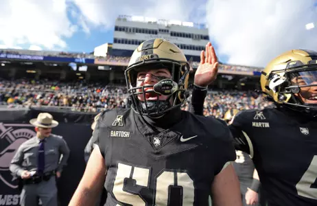 Nov 30, 2024; West Point, New York, USA; Army Black Knights offensive lineman Braden Bartosh (50) screams on the sidelines during the first half against the UTSA Roadrunners at Michie Stadium. Mandatory Credit: Danny Wild-Imagn Images