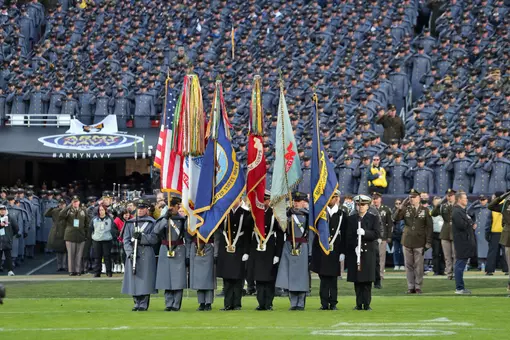 Dec 14, 2024; Landover, Maryland, USA; The joint-academy color guard holds flags during the national anthem before the first half of the the 125th Army-Navy game at Northwest Stadium. Mandatory Credit: Danny Wild-Imagn Images
