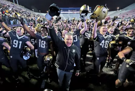 Dec 28, 2024; Shreveport, LA, USA; Army Black Knights head coach Jeff Monken and the Army Black Knights celebrate a 27-6 win against the Louisiana Tech Bulldogs to capture the 2024 Radiance Technologies Independence Bowl at Independence Stadium. Mandatory Credit: Danny Wild-Imagn Images