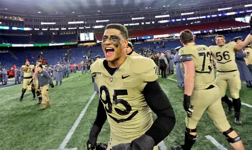 Dec 9, 2023; Foxborough, Massachusetts, USA; Army Black Knights defensive lineman Kyle Lewis (95) celebrates after a 17-11 win against the Navy Midshipmen in the Army-Navy Game at Gillette Stadium. Mandatory Credit: Danny Wild-USA TODAY Sports