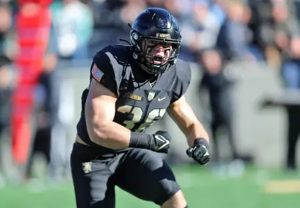 Nov 18, 2023; West Point, New York, USA; Army Black Knights linebacker Brett Gerena (36) screams after a defensive stop against the Coastal Carolina Chanticleers during the first half at Michie Stadium. Mandatory Credit: Danny Wild-USA TODAY Sports