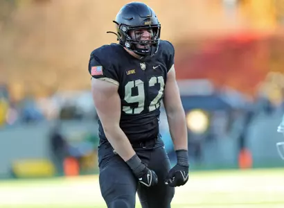 Nov 18, 2023; West Point, New York, USA; Army Black Knights defensive lineman Jack Latore (92) celebrates a defensive stop against the Coastal Carolina Chanticleers during the second half at Michie Stadium. Mandatory Credit: Danny Wild-USA TODAY Sports