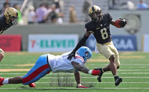 Sep 9, 2023; West Point, New York, USA; Army Black Knights defensive back Justin Weaver (8) returns a punt against the Delaware State Hornets during the second half at Michie Stadium. Mandatory Credit: Danny Wild-USA TODAY Sports