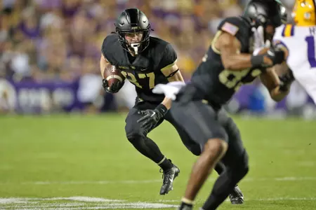 Oct 21, 2023; Baton Rouge, Louisiana, USA; Army Black Knights wide receiver Casey Reynolds (87) makes a catch against the LSU Tigers during the first half at Tiger Stadium. Mandatory Credit: Danny Wild-USA TODAY Sports